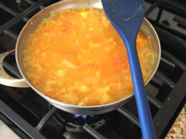 Making a big pot of sauce with garden tomatoes